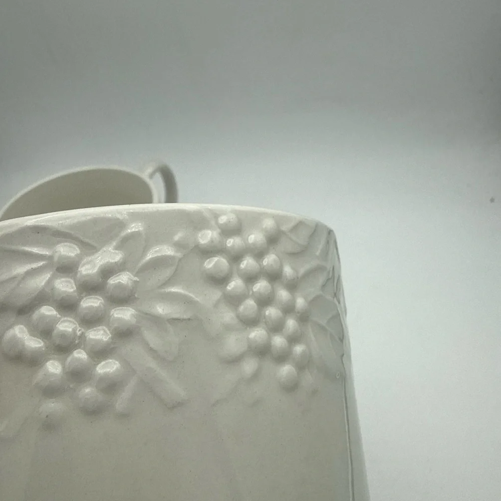Pair Of Pier 1 Coffee Mugs White raised Fruit grape pears strawberries design